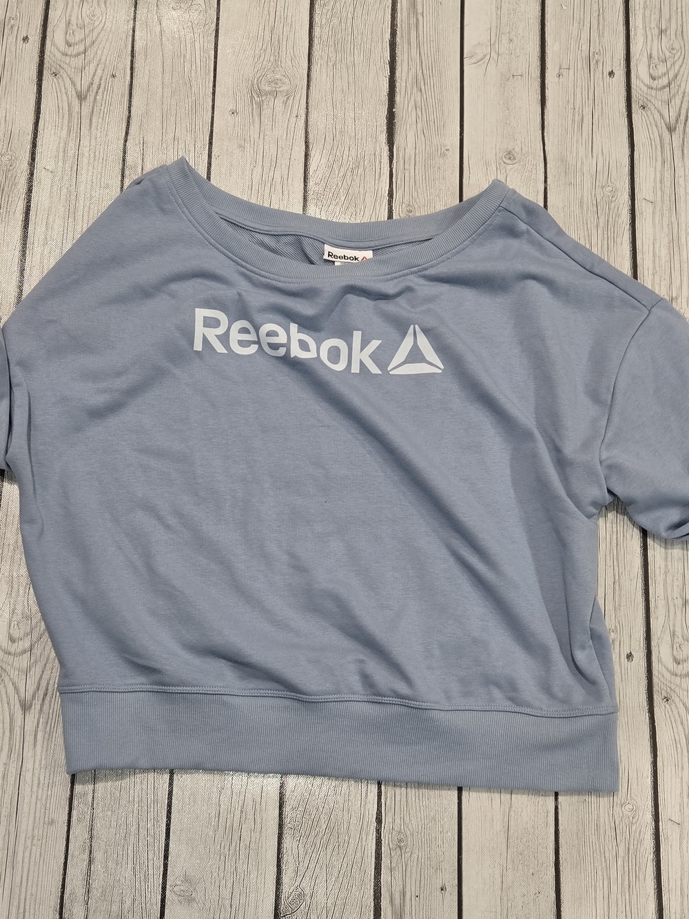 NWOT Reebok Light Blue Off The Shoulder Logo Sweatshirt Womens L
